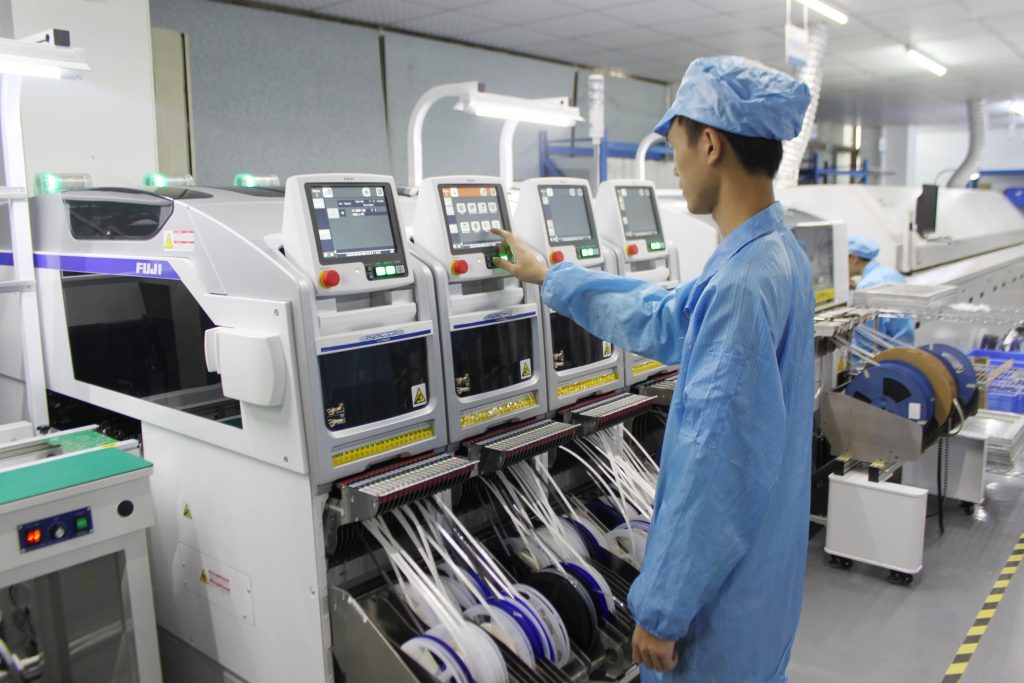 Turnkey PCBA manufacturing line with SMT, reflow, and AOI/X-ray inspection stations